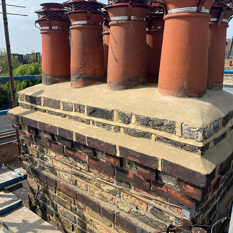 chimney breast leak, chimney crown leak, chimney flashing leak, chimney leaking repair, chimney leaning